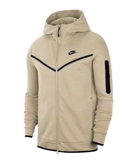 beige nike tech fleece tracksuit.